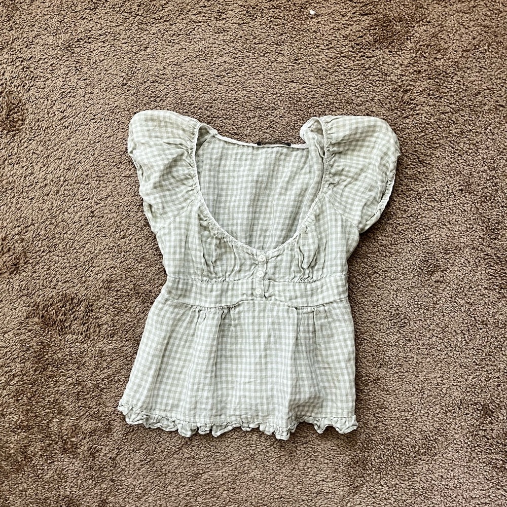 BRADY RUFFLE TOP